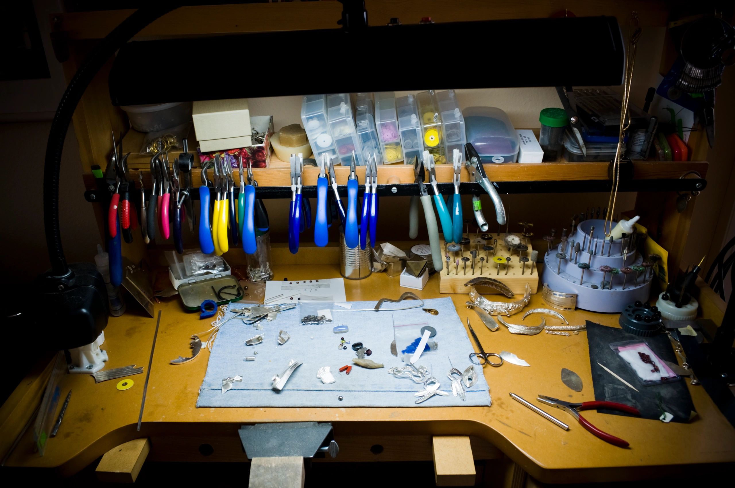 Silversmith work desk with jewelry tools